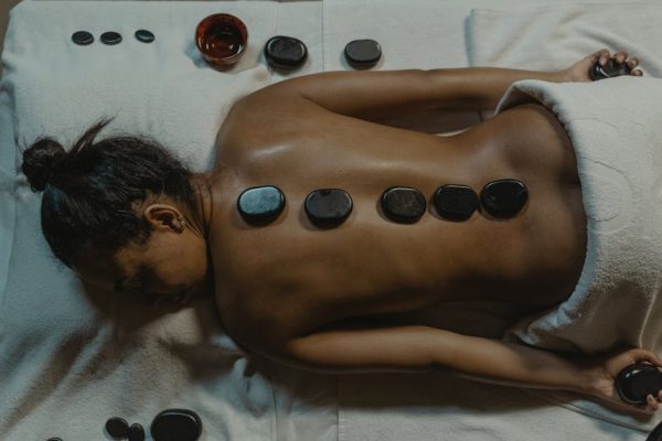 Why Hot Stone Massage Relieves Chronic Pain